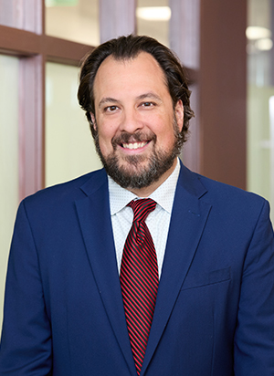 andrew lonard attorney headshot close-up